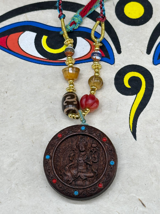 Collana a tara verde e osteologia mandala ( legno)