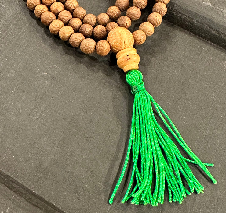Mala semi di rudraksha con nappa