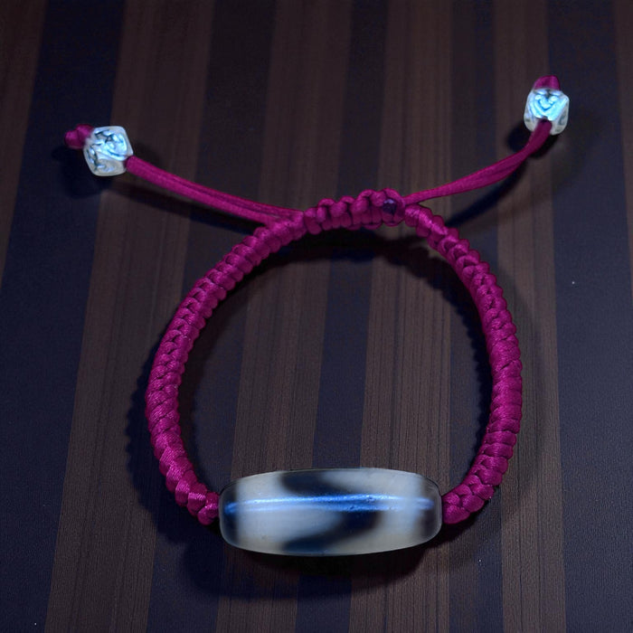 Bracciale Dzi tibetano con Dente di Cavallo