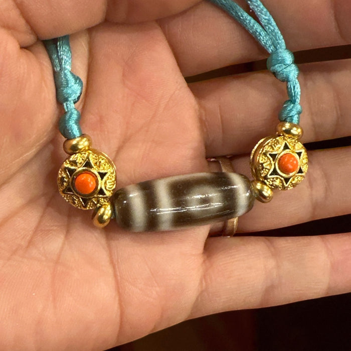 Dzi tibetano a 2 Occhi e Grani di Mandala