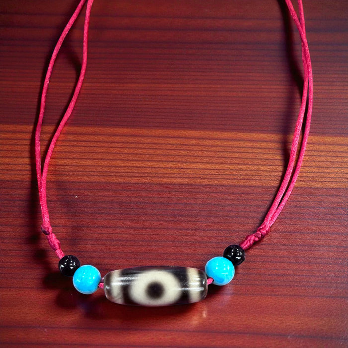 Dzi tibetano a cielo e terra con grano a  Turchese e Tormalina Nera