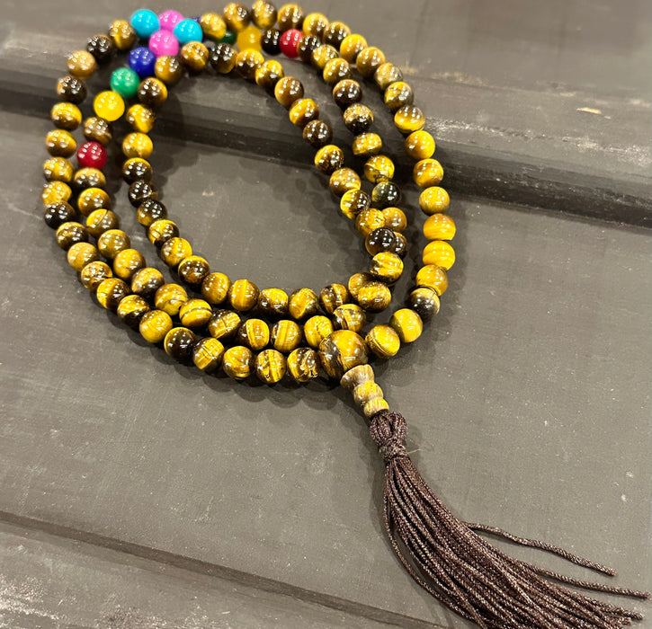 Mala occhio di tigre con 7 chakra e nappa