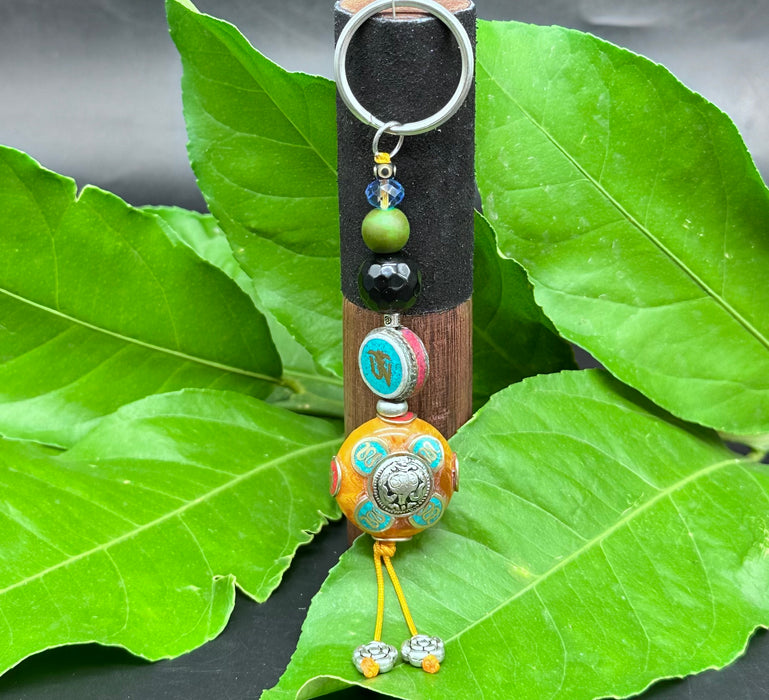 Porta chiavi tibetano con Om