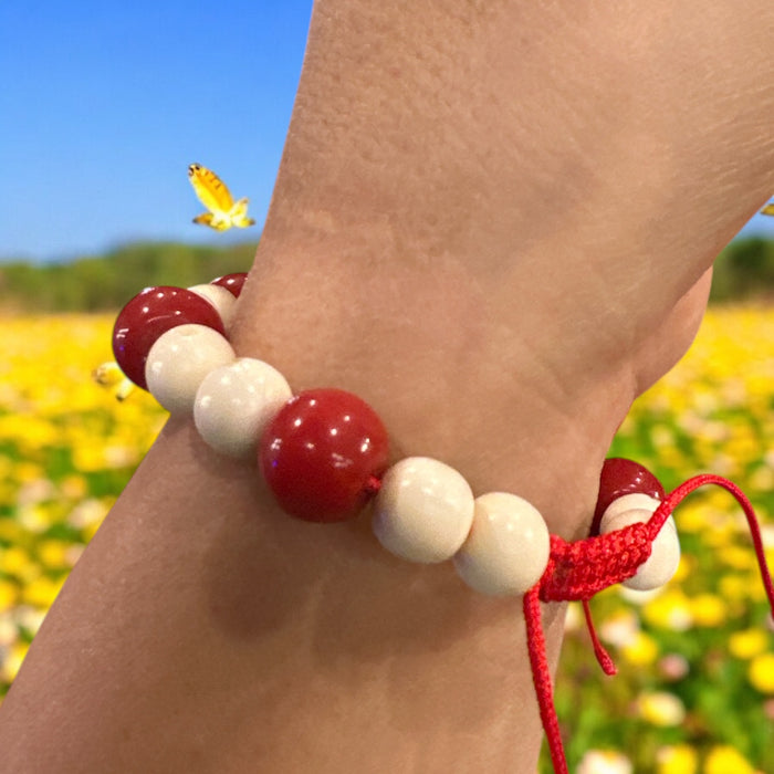 Braccialetto con corallo di bamboo e denti di elefante