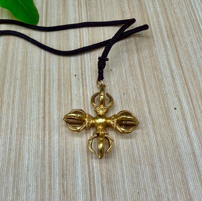 Ciondolo tibetano con doppio Vajra