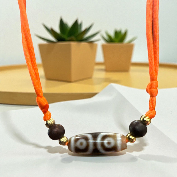 Dzi tibetanno 3 occhi con pietra onice