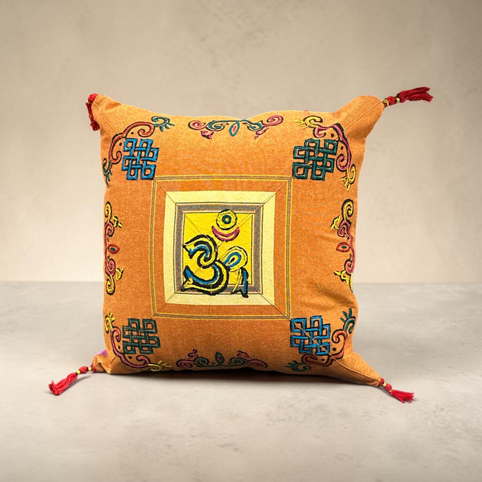 Cushion with embroidered om