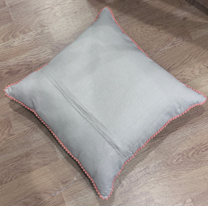Embroidered flower cushion