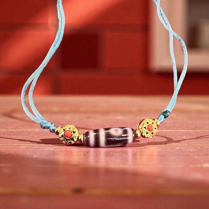 Dzi tibetano a 2 Occhi e Grani di Mandala