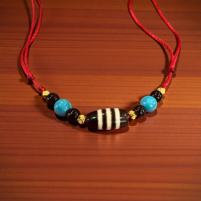 Chung Dzi tibetano con Turchese