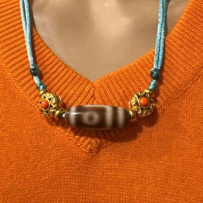 Dzi tibetano a 2 Occhi e Grani di Mandala