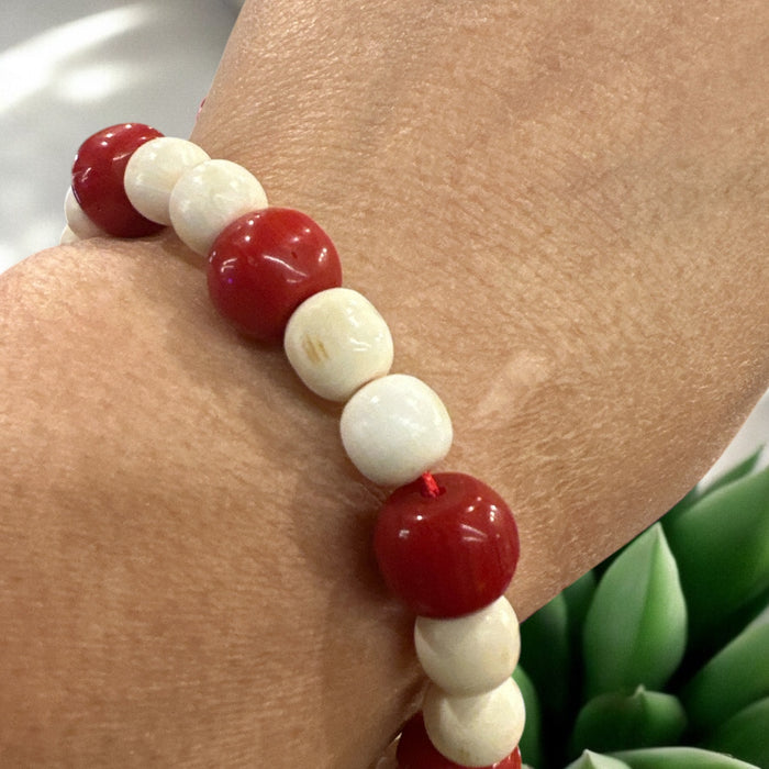 Braccialetto con corallo di bamboo e denti di elefante