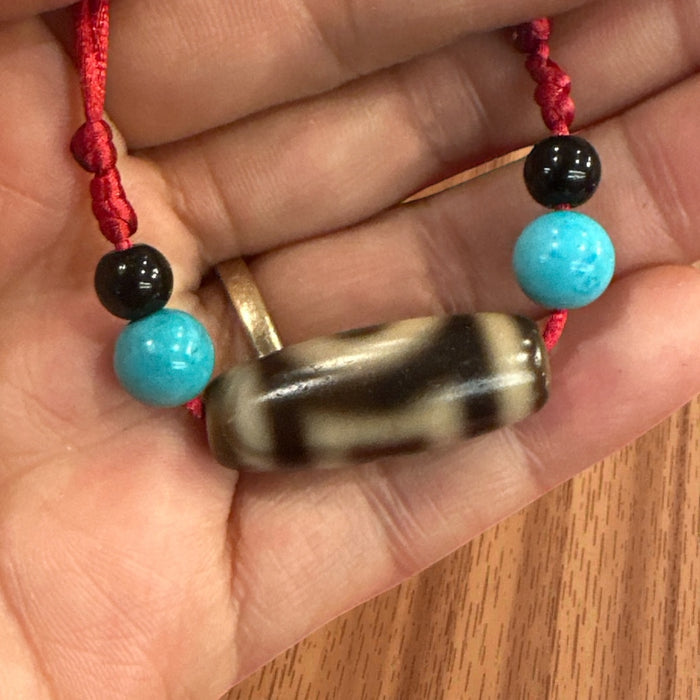 Dzi tibetano a cielo e terra con grano a  Turchese e Tormalina Nera