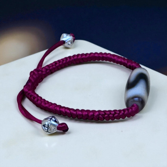 Bracciale Dzi tibetano con Dente di Cavallo