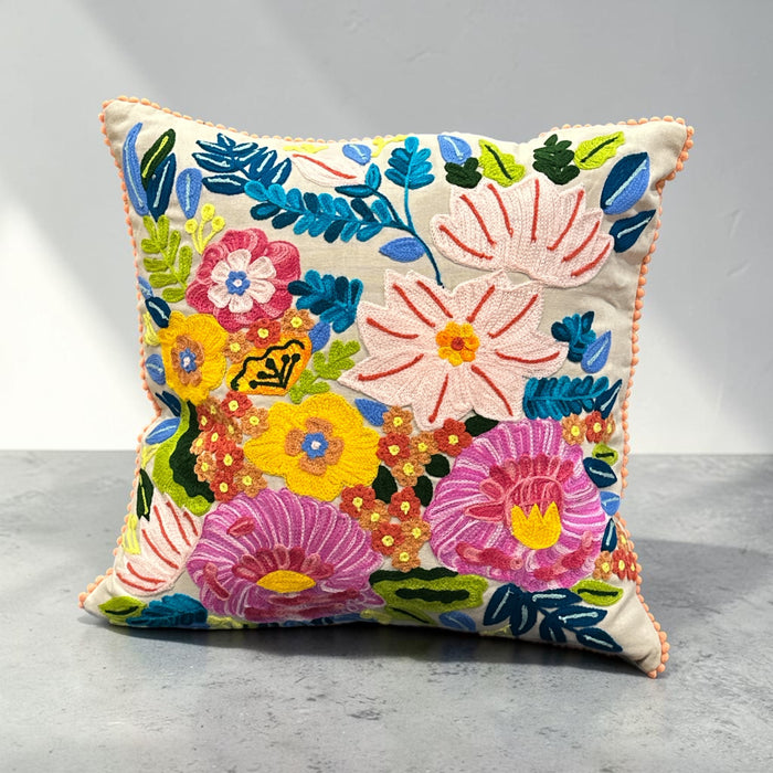 Embroidered flower cushion