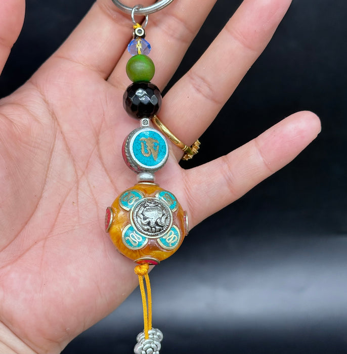 Porta chiavi tibetano con Om