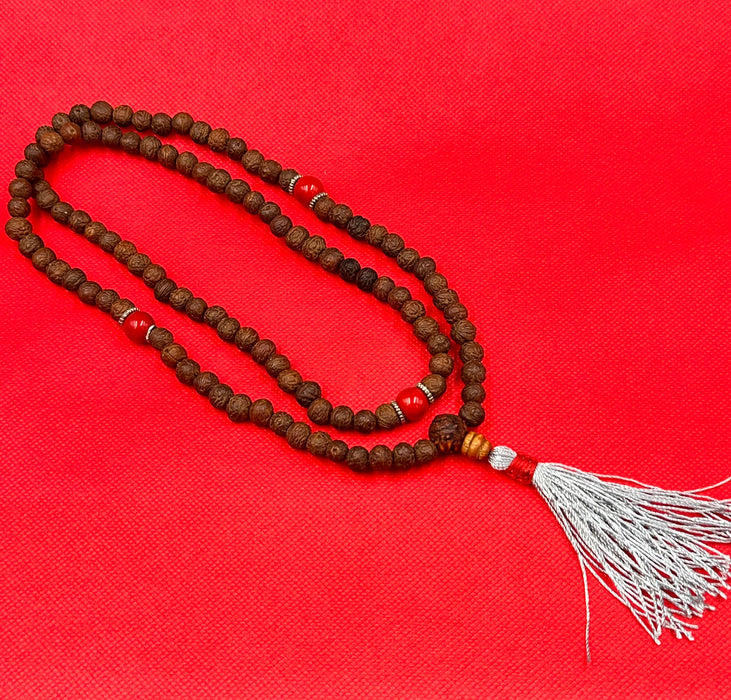 Mala semi di rudraksha con nappa