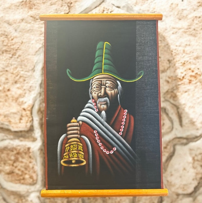 Uomo tibetano con vajra a mano