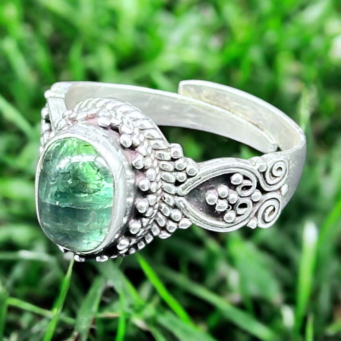 Tibetan ring with iridescent green Opal