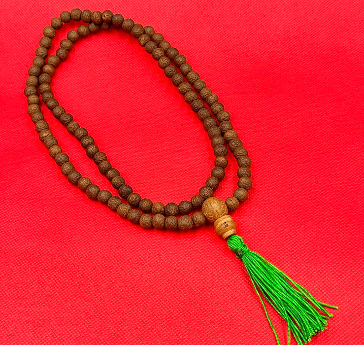Mala semi di rudraksha con nappa
