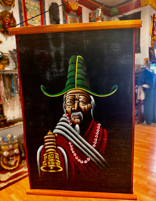 Uomo tibetano con vajra a mano