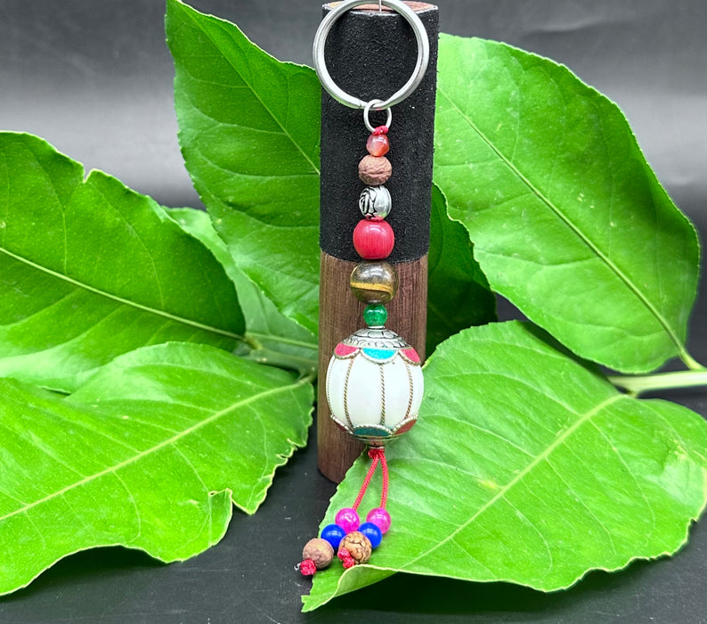 Porta chiavi tibetano con fiori di lotto
