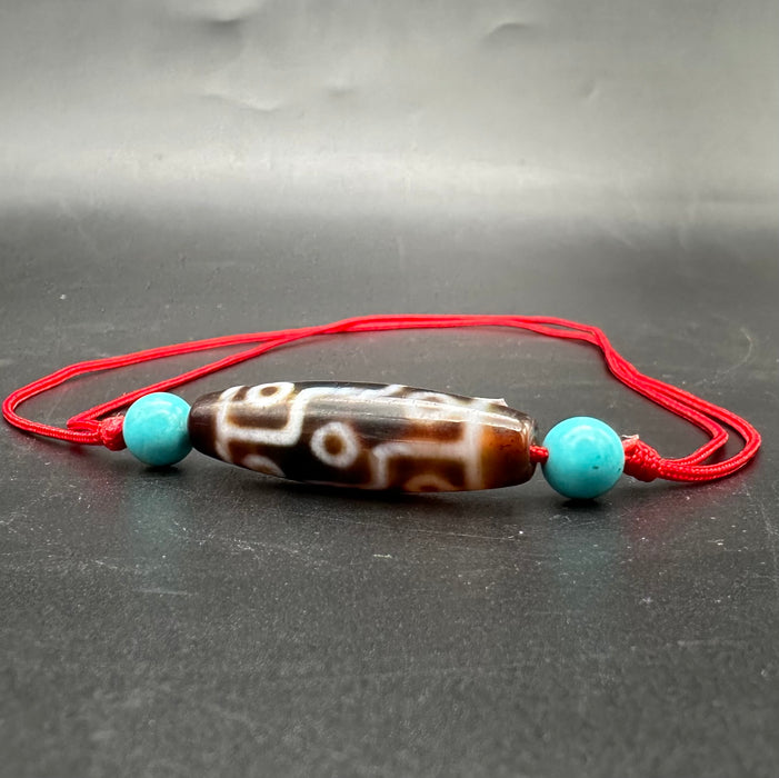 collana tibegana con 9 occhi dzi e turchese