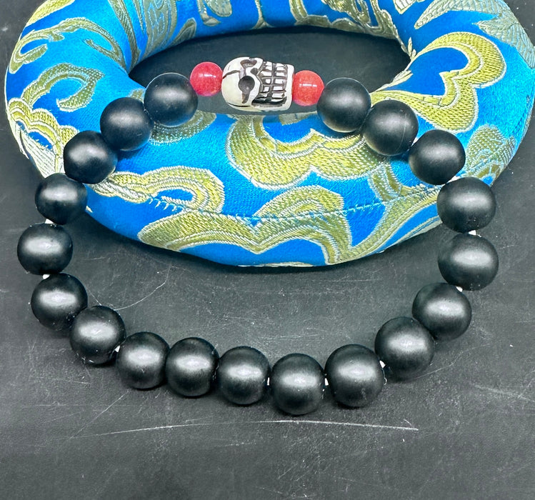 Bracciale tibetano con teschi