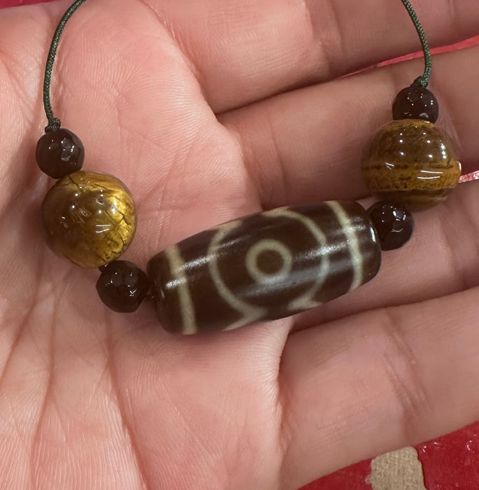 Necklace with 3 eyes and Tiger's Eye