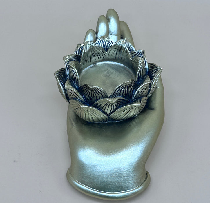 Porta candela con mano di pelma