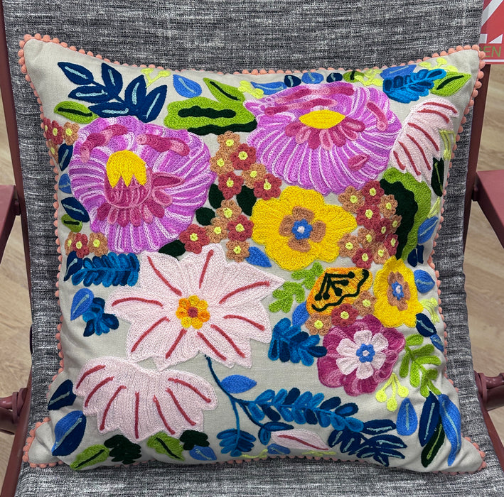 Embroidered flower cushion