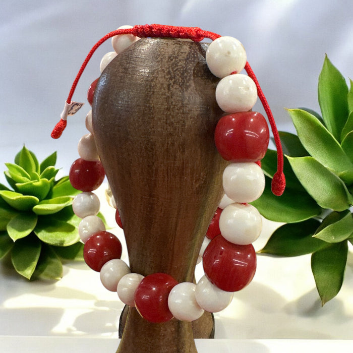 Braccialetto con corallo di bamboo e denti di elefante