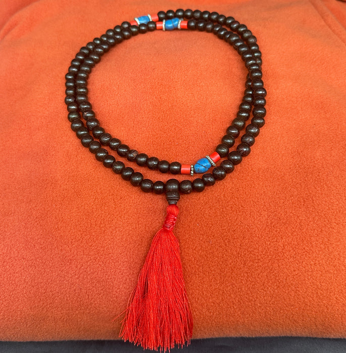 Mala sandalo con nappa