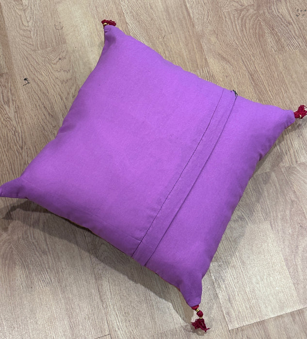 Cushion with embroidered om