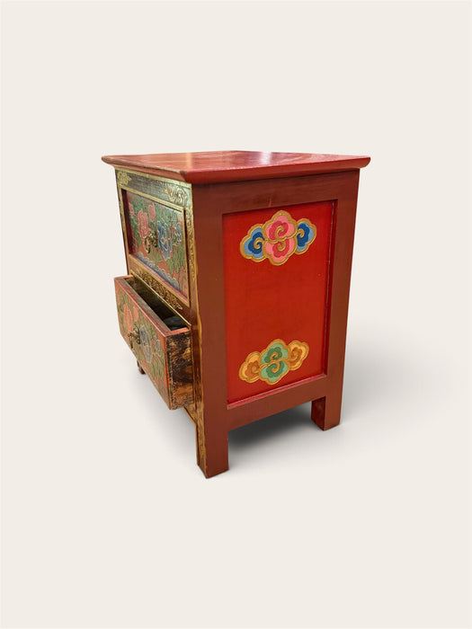 Comodino tibetano con fiori di lotto