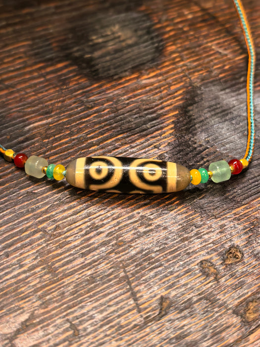 Dzi tibetano a sette occhi – Successo e realizzazione