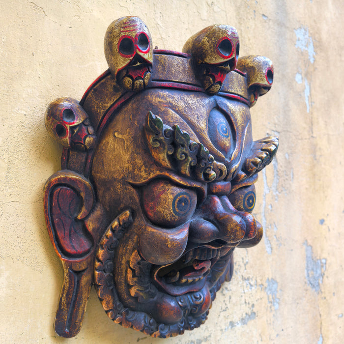 Maschera di Mahākāla in Legno scuro