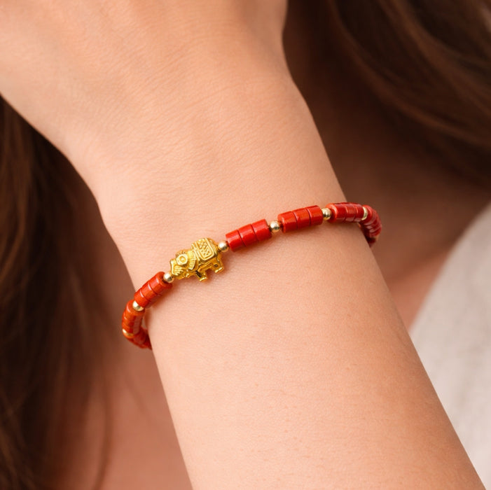 Jasper bracelet with golden elephant