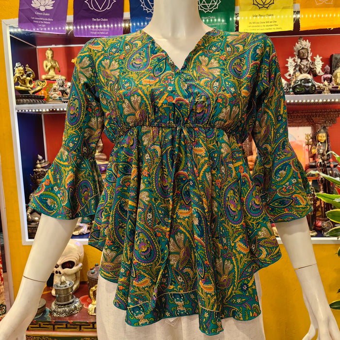 Blusa con maniche al gomito