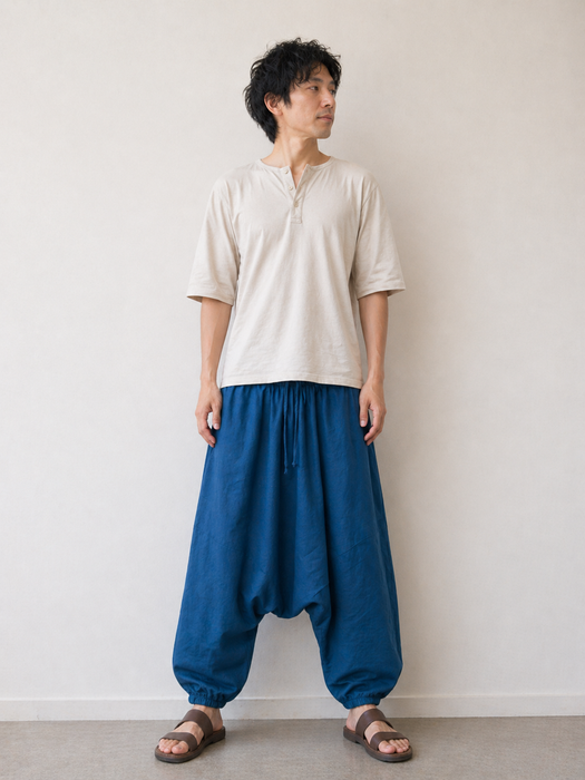 Pantalone cavallo basso in cotone blu petrolio