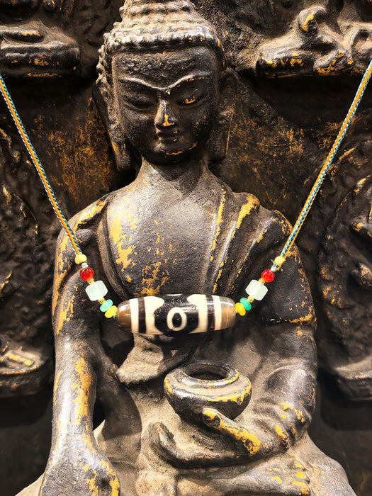 Dzi tibetano a tre occhi - ricchezza, prosperità, longevità