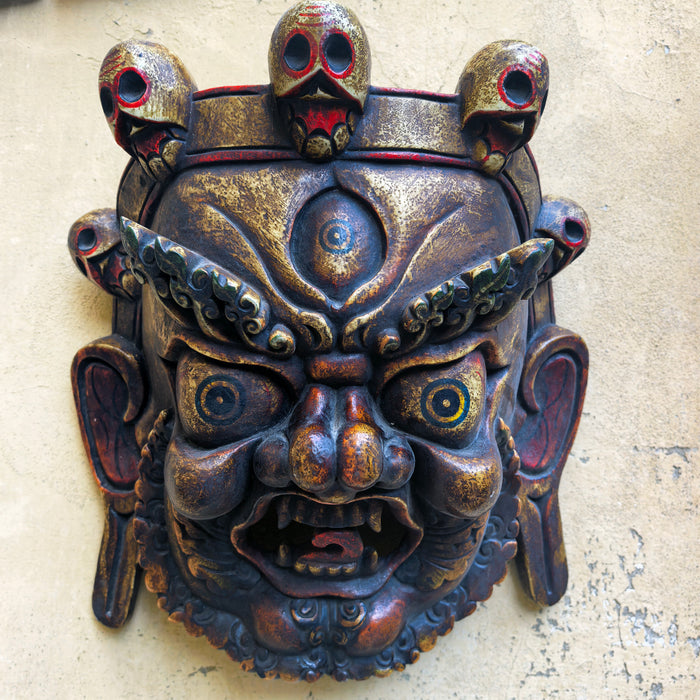 Maschera di Mahākāla in Legno scuro