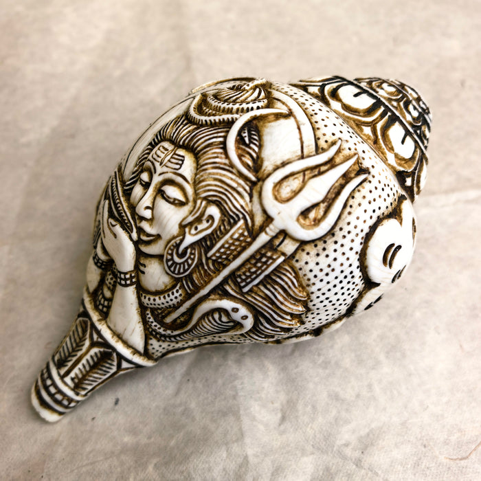 Conchiglia raffigurante di Shiva