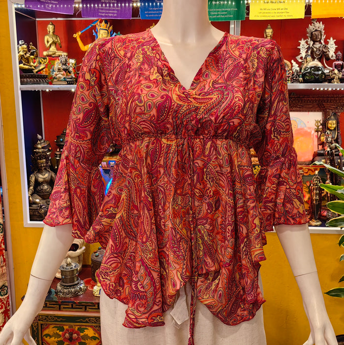 Blusa con con maniche al gomito