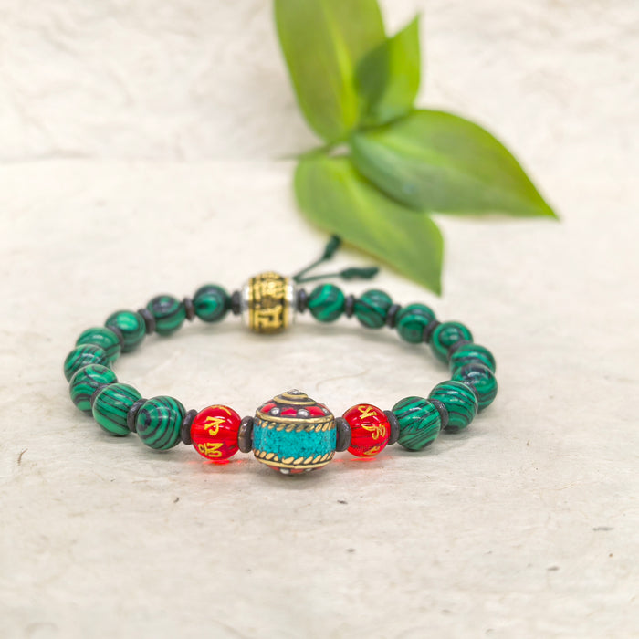 Braccialetto malachite con 2 perlini di om mani padme hum
