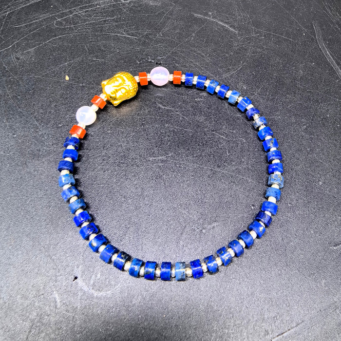 Braccialetto lapislazzuli con testa di Buddha