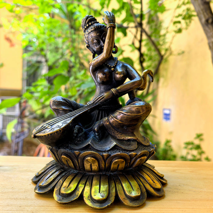 Saraswati on Lotus Flower - Handmade Statue from Nepal