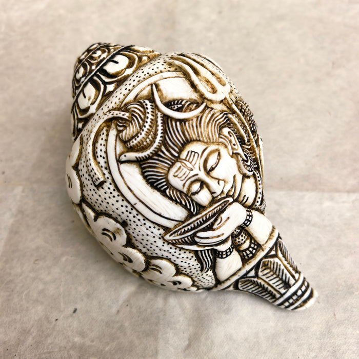 Conchiglia raffigurante di Shiva