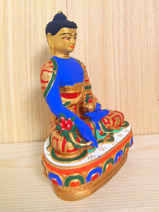 Statua Buddha della Medicina in bronzo dipinto a mano