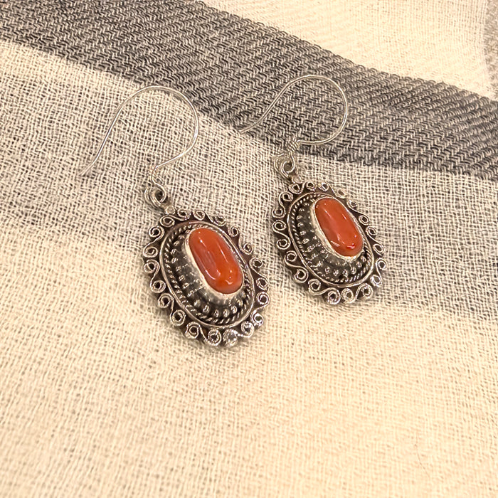 Orecchini con corallo tibetano